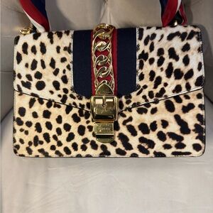 Authentic Gucci Leopard Print Pony Hair Sylvie Shoulder Bag 
Comes with COA